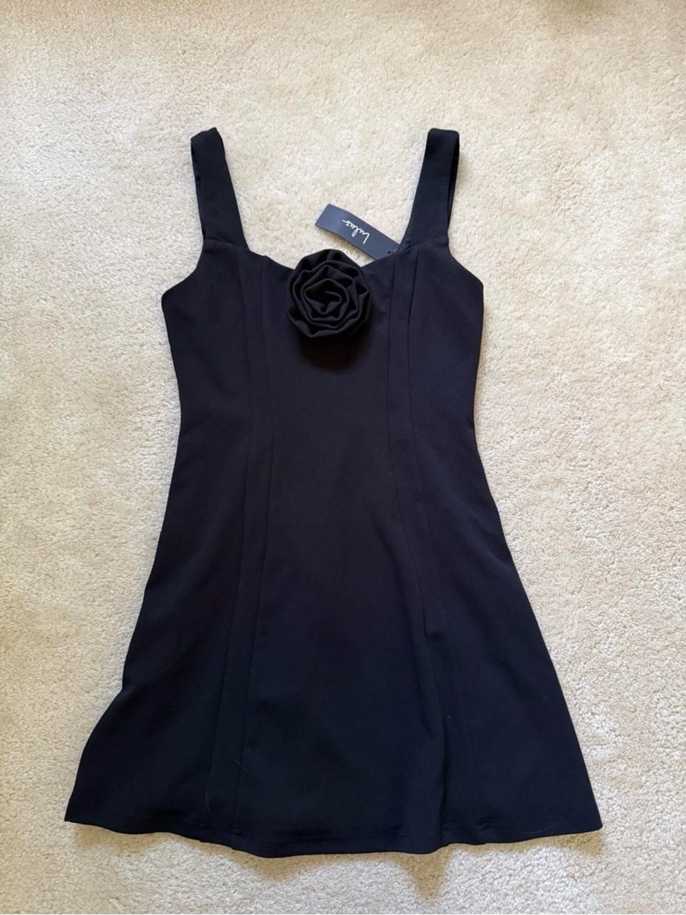 Lulu's Black Sleeveless Mini Dress with Rosette